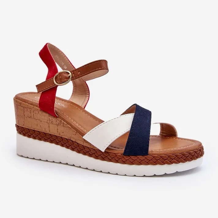 White and navy blue Kioda wedge sandals with straps