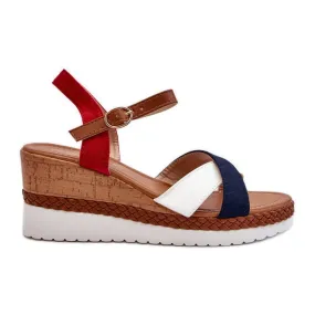 White and navy blue Kioda wedge sandals with straps