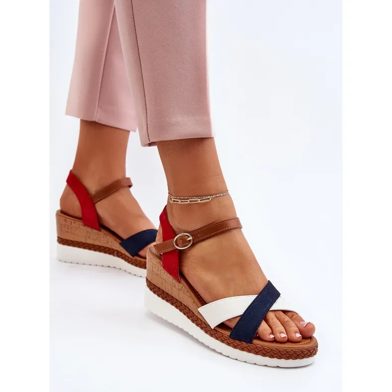 White and navy blue Kioda wedge sandals with straps