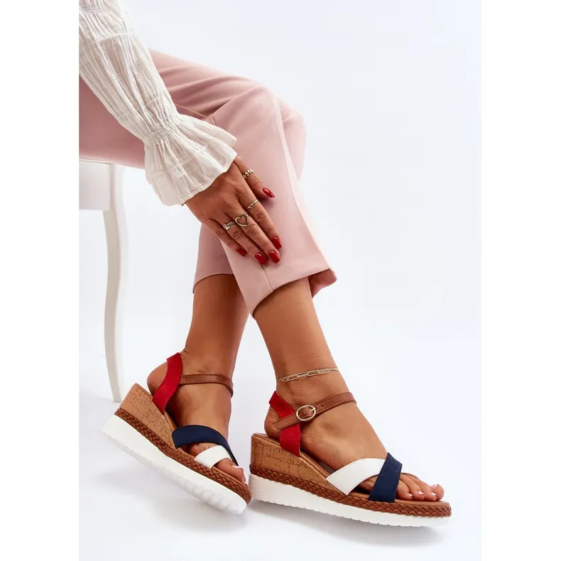 White and navy blue Kioda wedge sandals with straps